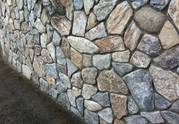 Retaining wall and stone veneer